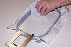 Remove the backing from the Sticky machine embroidery stabilizer.