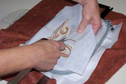 Cut away the cut-a-way machine embroidery stabilizer.